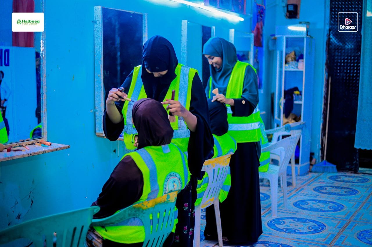Student repairing a mobile phone